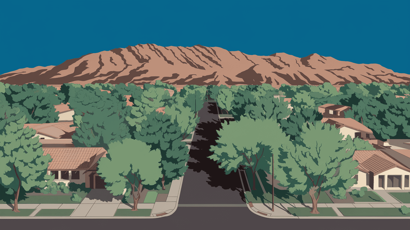 Aerial view of a tree-lined residential street in Albuquerque's Northeast Heights neighborhood with the Sandia Mountains rising sharply in the background under a deep blue New Mexico sky